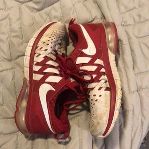 Red and white nike shoes
